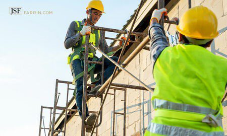 Construction workers on scaffolding